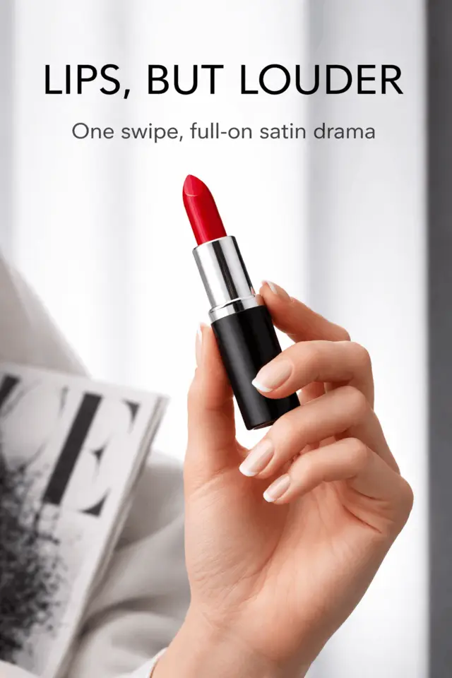 Lifestyle product image of red lipstick held near a window